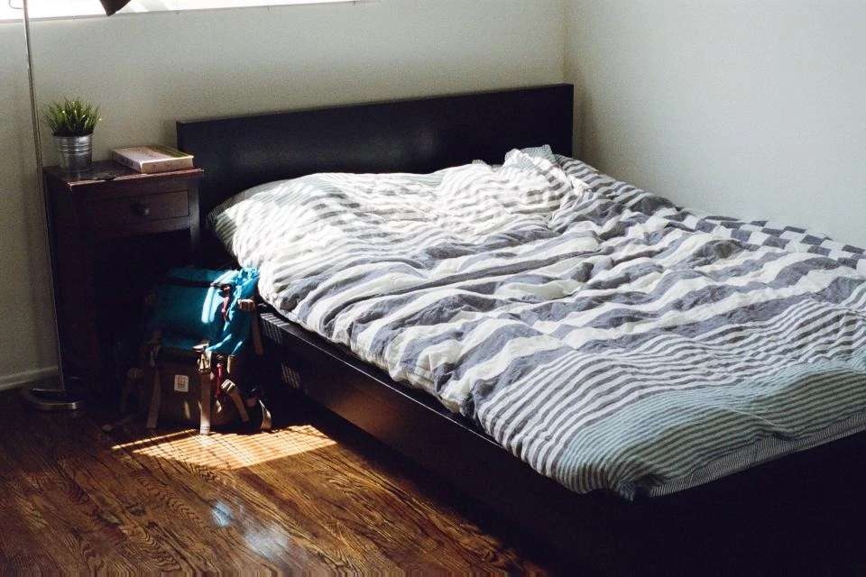 Original bedroom practice photo used in a documented RoomRedecor example